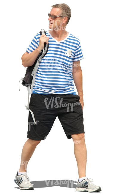 man in a striped shirt walking