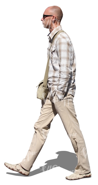 cut out man in a beige outfit walking