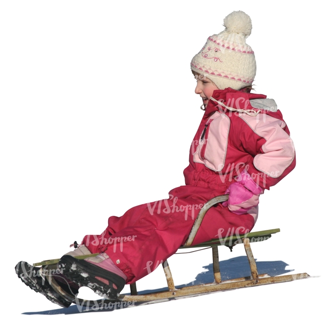 little girl sledging downhill