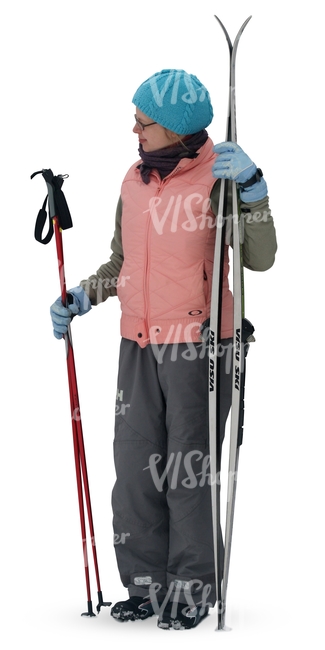 cut out woman standing with skis