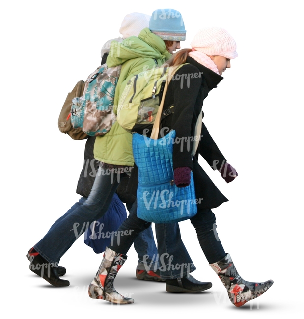 three cut out girls walking in winter