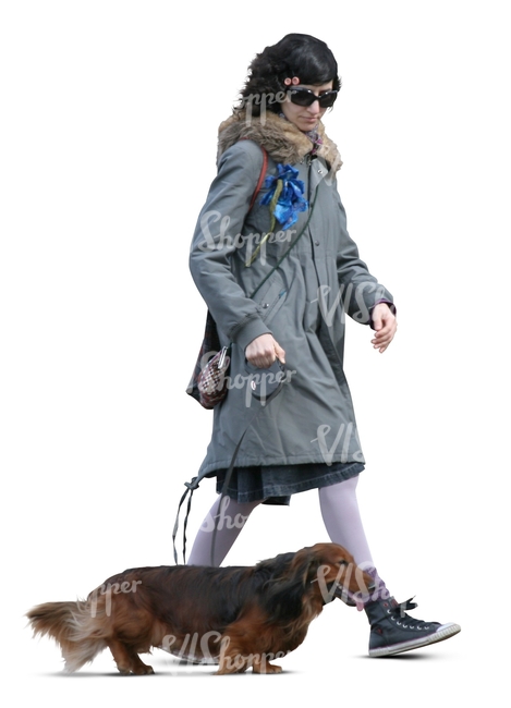 cut out woman walking a dachshund