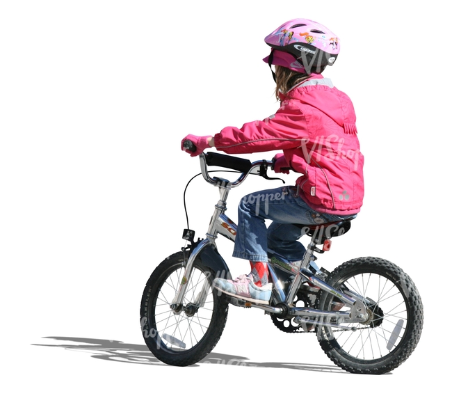 young girl with a helmet riding a bike