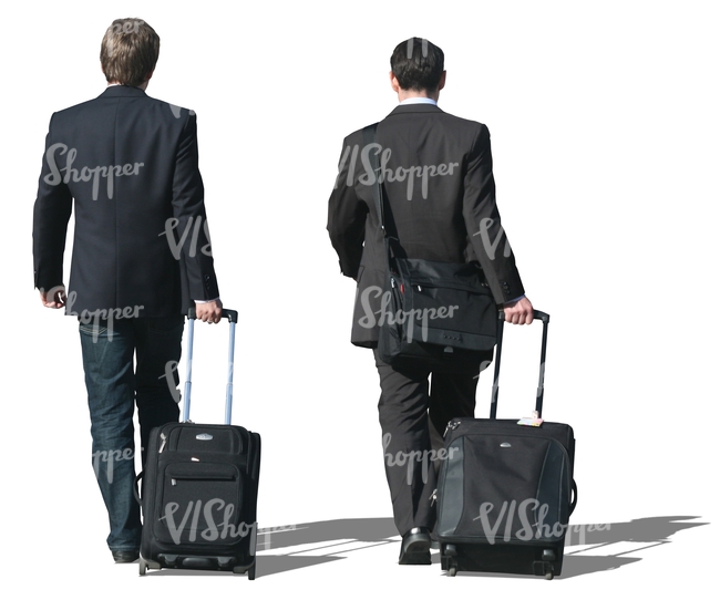 two travelling businessmen walking with suitcases