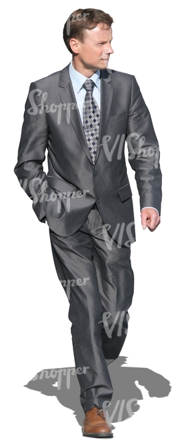 businessman in a grey suit walking