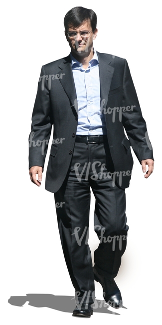 businessman in a black suit walking