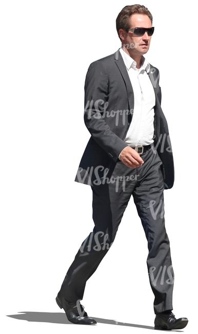 businessman with sunglasses walking