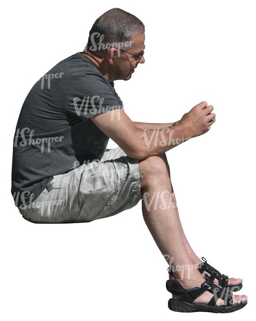 cut out man in shorts sitting