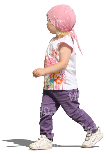 cut out girl with a head scarf walking