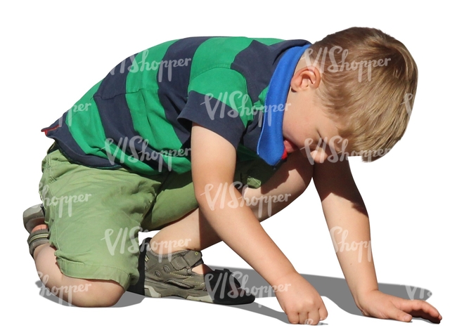 cut out boy playing on the ground