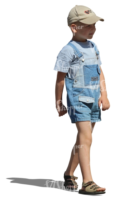 cut out young boy with a hat walking