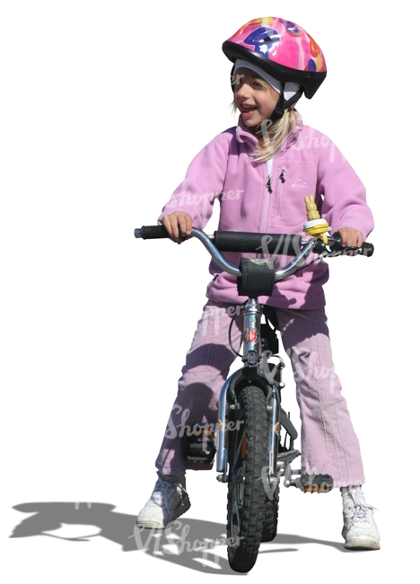 cut out girl with a helmet riding a bike