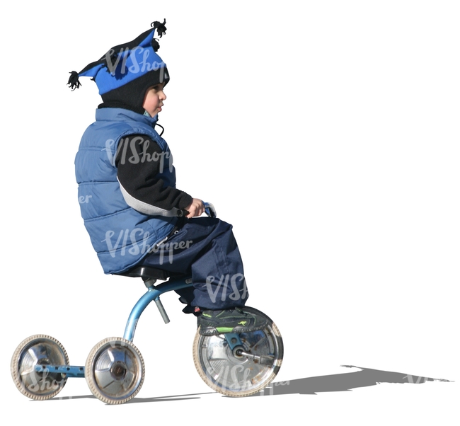 cut out boy riding a three-wheeled bike