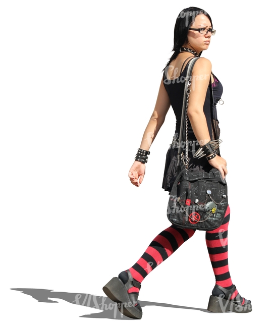 cut out woman in goth style outfit walking