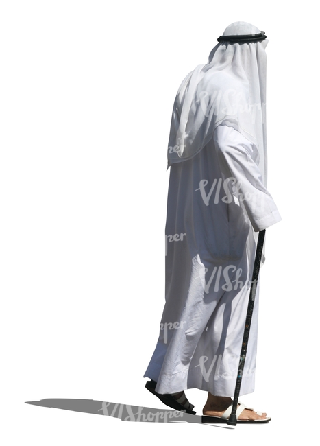 arab man in a white dishdasha walking 