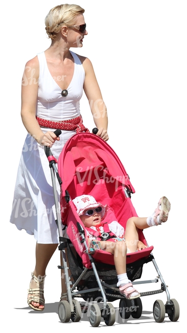 woman in a dress pushing a stroller