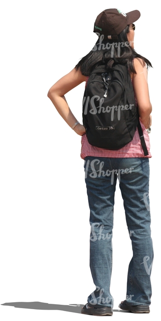woman with a backpack standing and looking