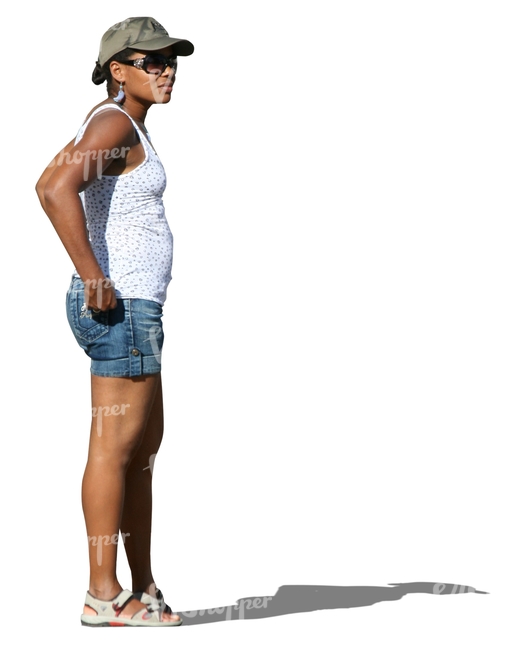 african woman in shorts standing