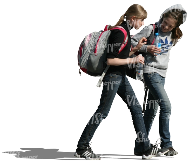 two teenage girls with backpacks walking together