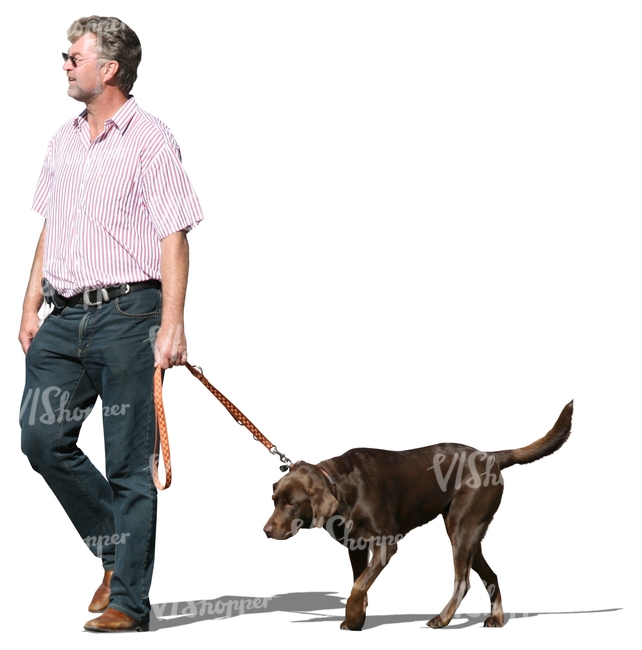 middle-aged man walking a dog