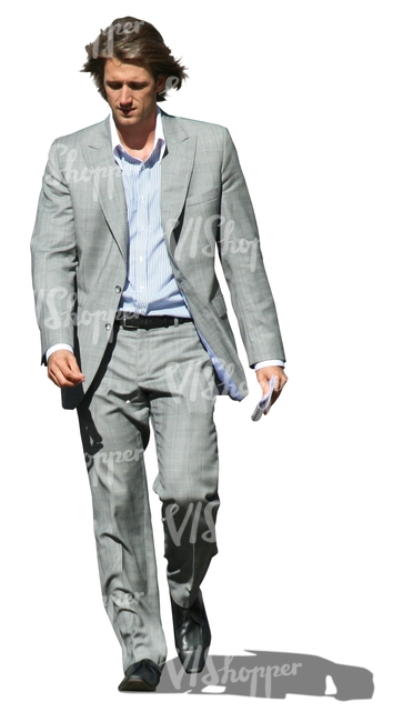 man in a grey suit walking