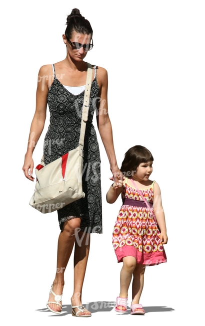 mother and daughter in summer dresses walking together