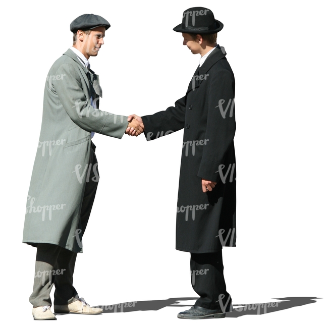 two men with hats shaking hands