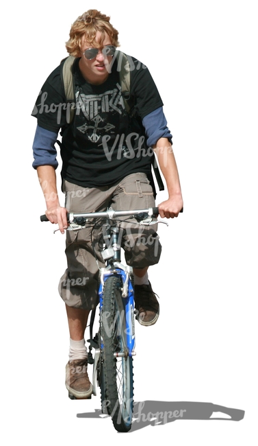 teenage boy riding a bike