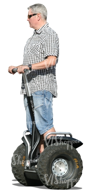 grey-haired man riding a segway