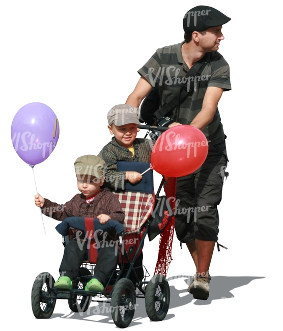 man pushing a baby stroller with two boys in it