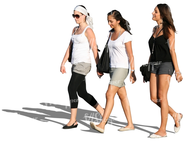 three women walking in summertime