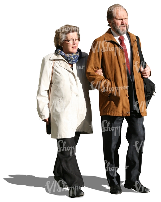 elderly couple walking arm in arm