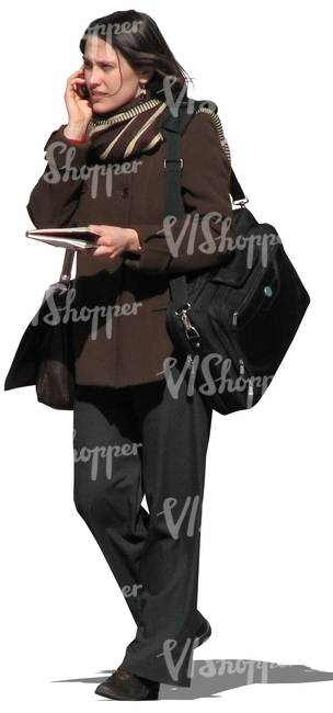 businesswoman in a brown coat walking