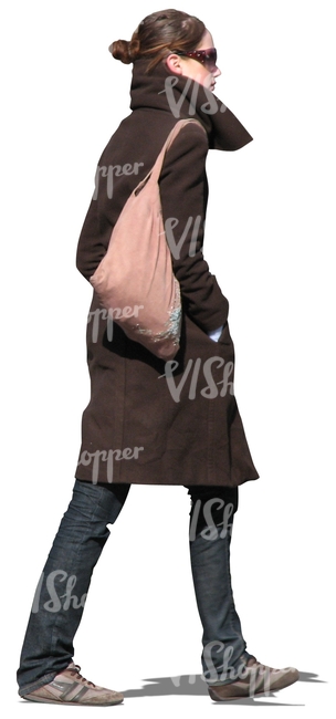 woman in a brown coat walking