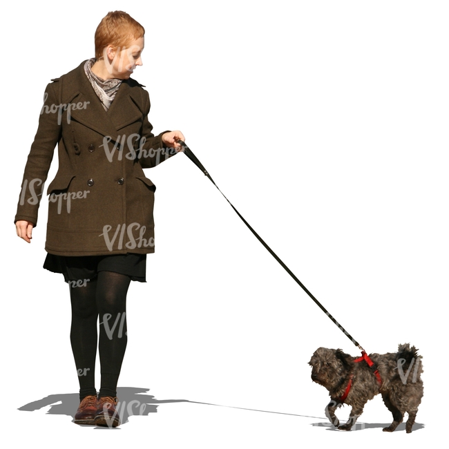 woman walking with a small dog