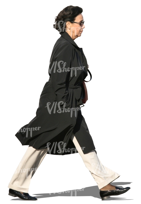 woman in a black autumn coat walking