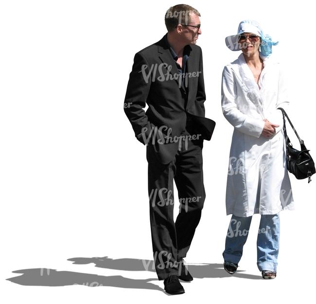 formally dressed man and woman walking