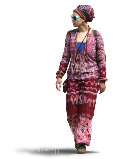 woman in a pink bohemian outfit walking