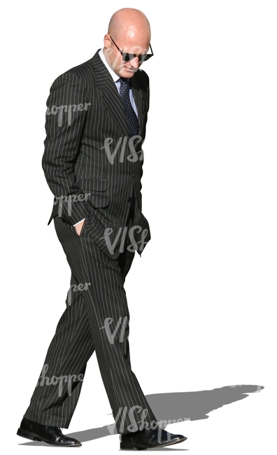 businessman in a striped suit walking