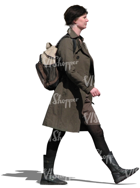 woman in a brown spring coat walking