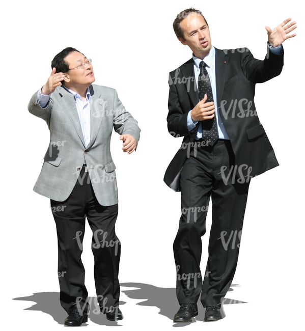 two businessmen walking and talking