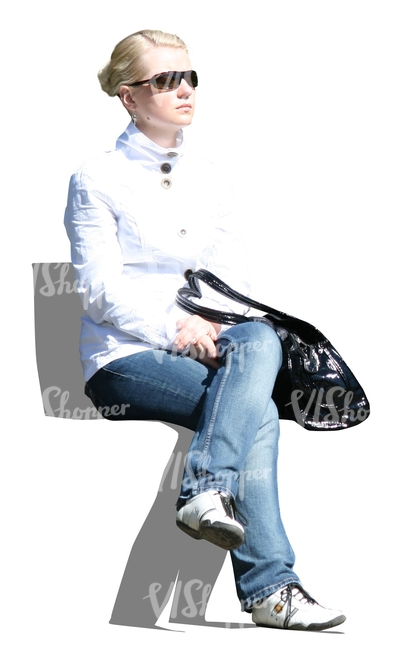 woman in a white spring jacket sitting