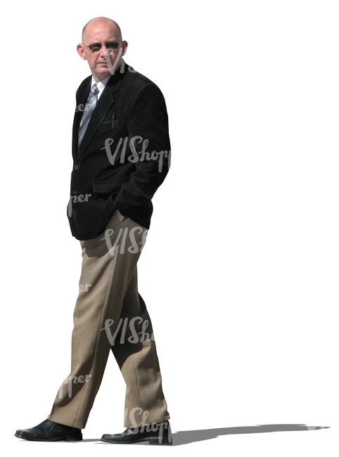 elderly businessman walking