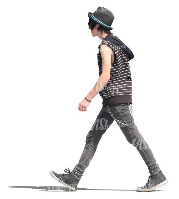 young man in punk style outfit walking