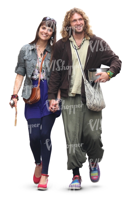 bohemian couple walking hand in hand