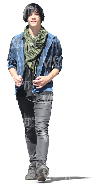 teenage boy in rock style outfit walking
