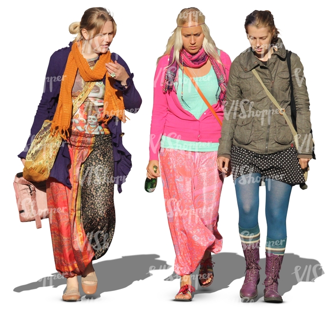 three hippie women walking together