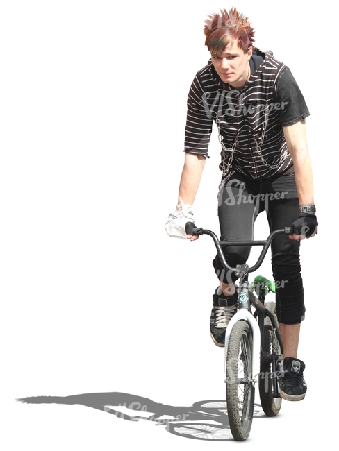 young man riding a bmx bike