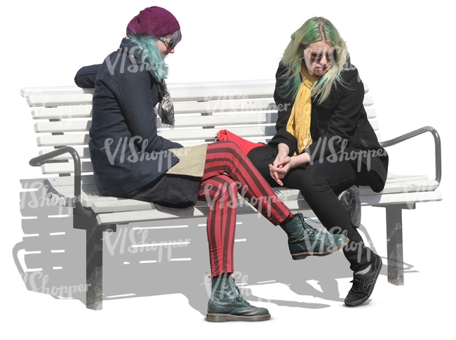 two punk women sitting on a bench