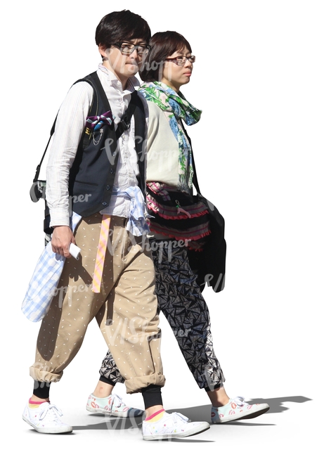 two bohemian asian people walking together